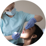 Photo of dental expert examining patient's teeth